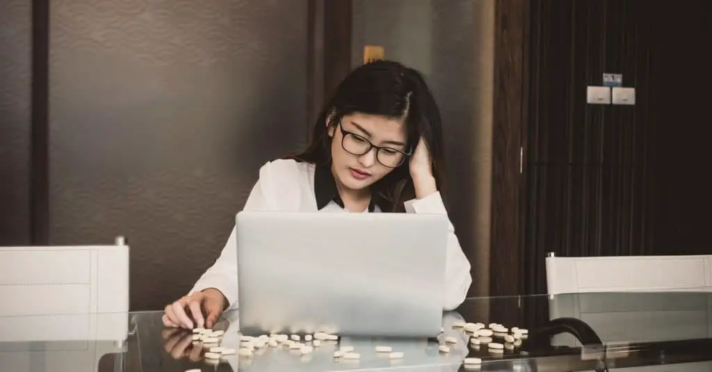 depressed businesswoman with casual suit in seriuos action while working with computer laptop