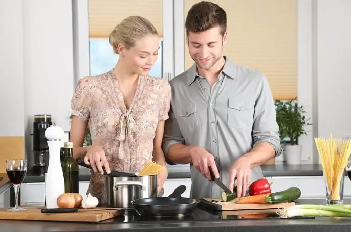 couple cooking together