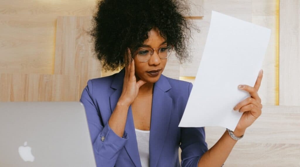 women studying project papers