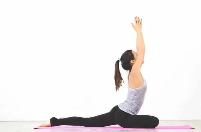 asian women during yoga session