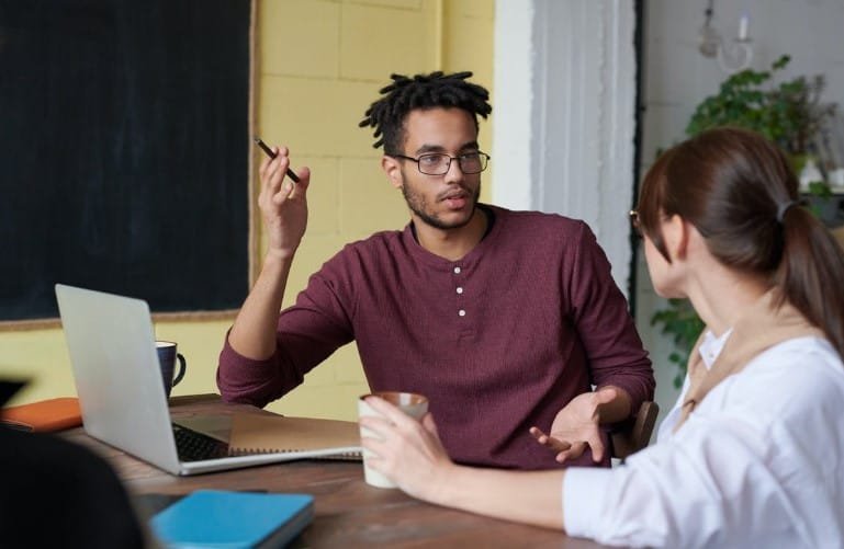 collegues arguing in office