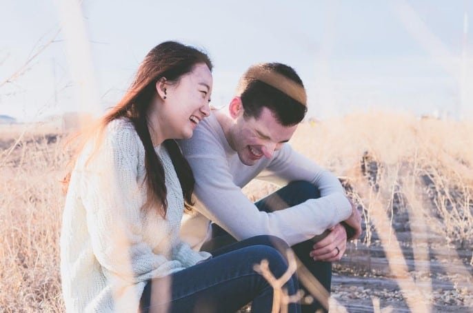 couple laughing at jokes