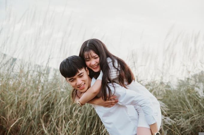 teen couple in the fields