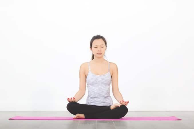 women practicing meditation