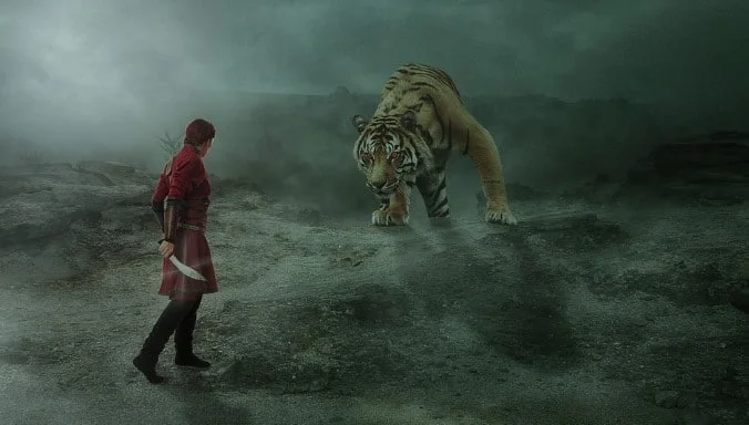 warrior confronts a tiger