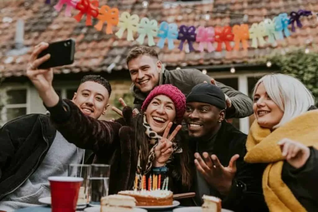 friends taking a group selfie