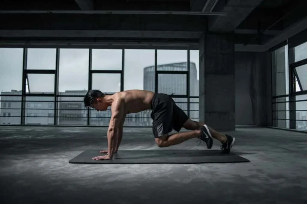 man working out on a mat