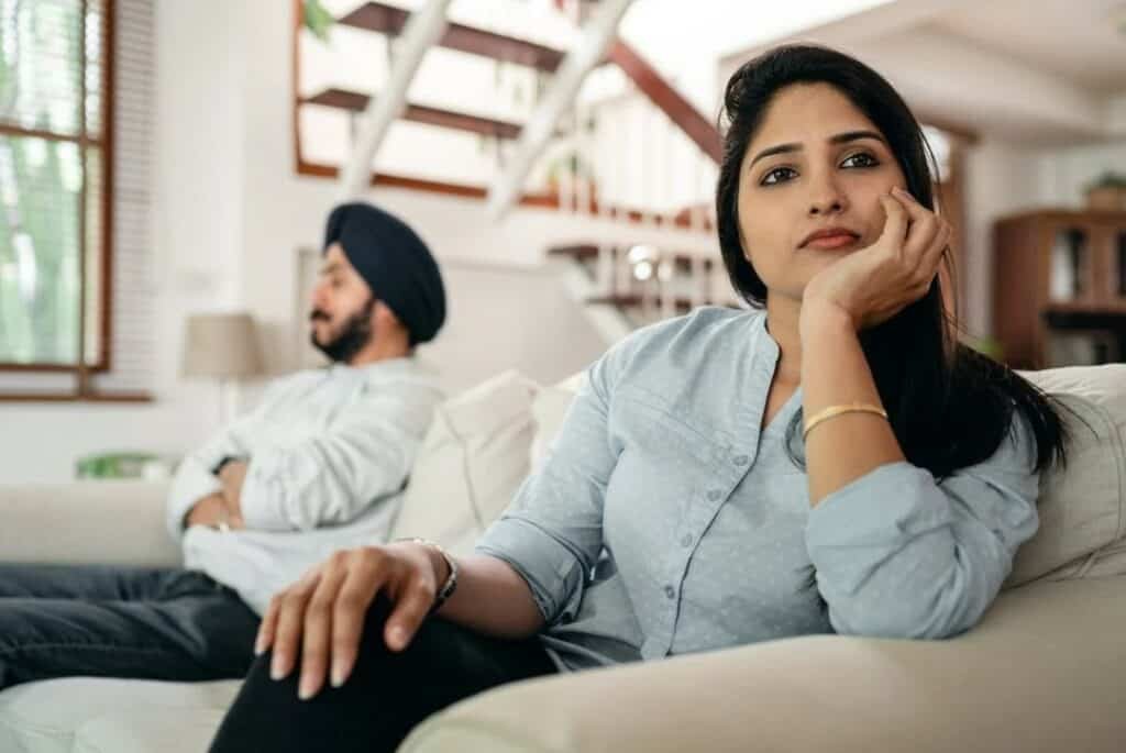 sad Indian couple not talking with each other