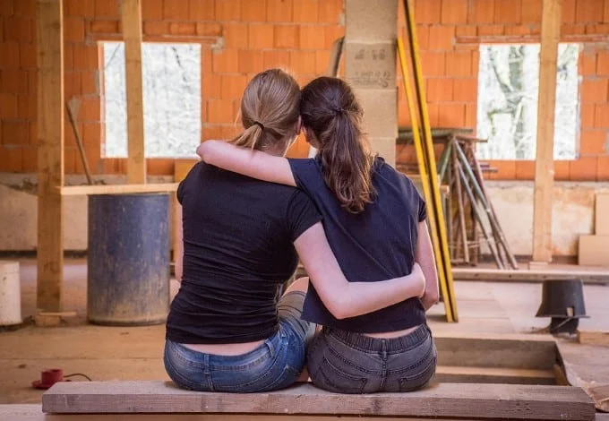 two women hugging