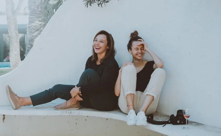 two women laughing