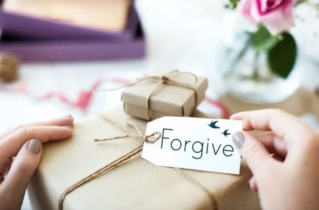 parcel with a “forgive” tag