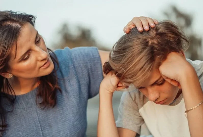 mother talking with her teenage son