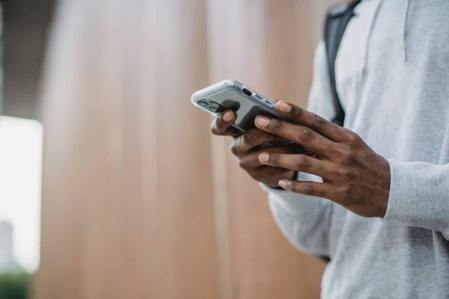 man browsing on mobile phone