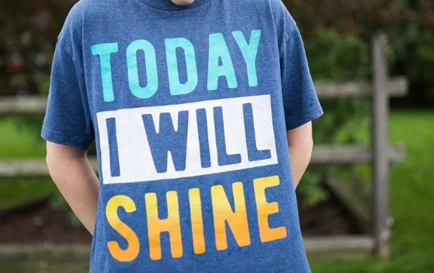 man wearing inspirational tshirt