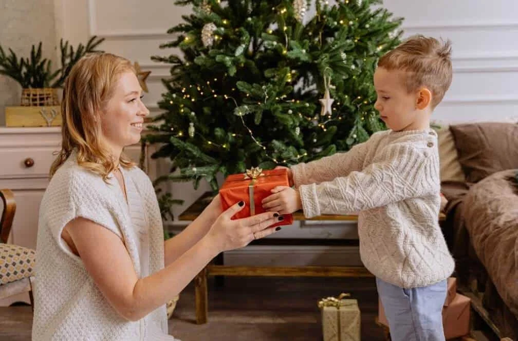 mother giving gift to the child