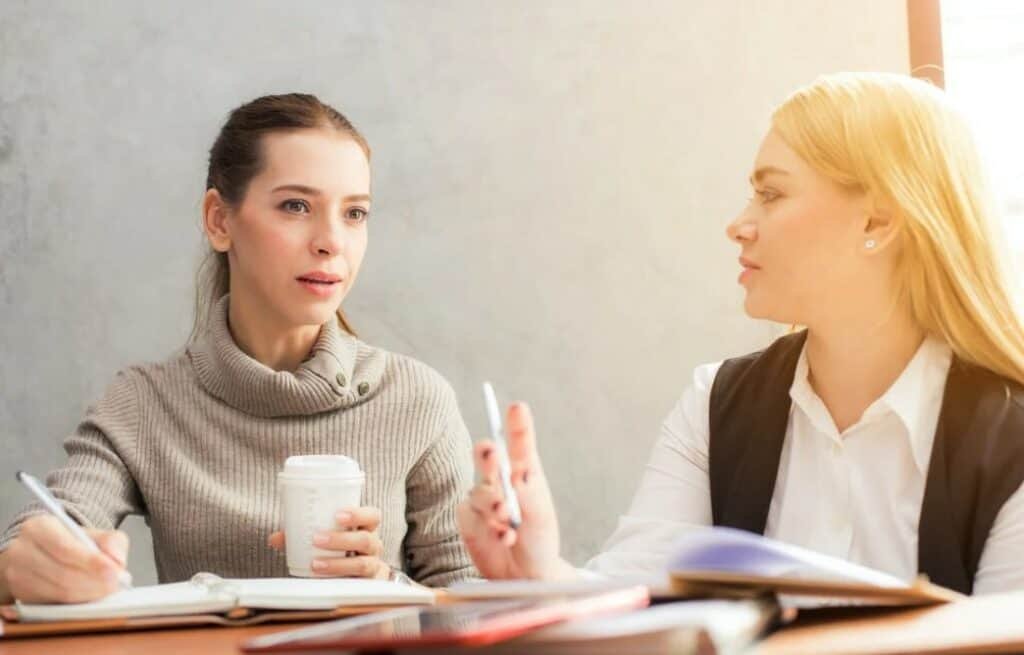 two girls in meeting