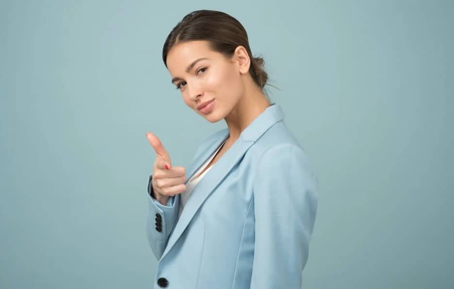 confident woman in blue jacket