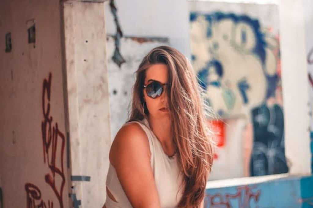 Confident woman wearing sunglasses